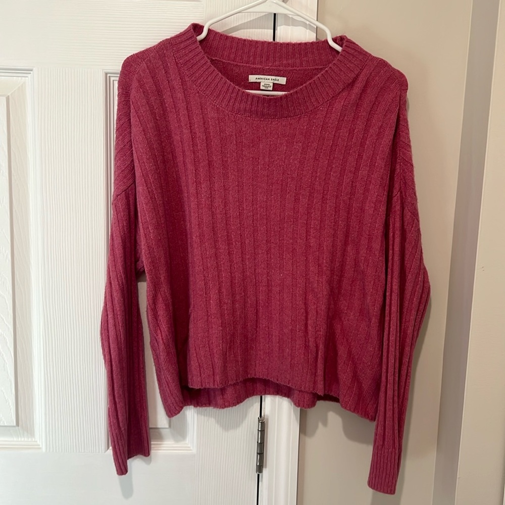 American Eagle sweater in pink. Size medium.